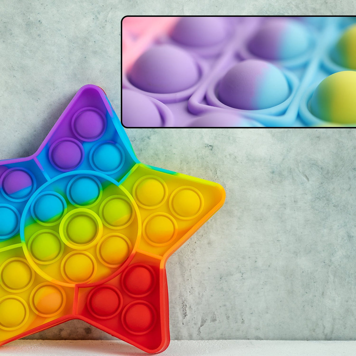 Side profile of the Star Fidget Toy, illustrating its slim and portable nature.